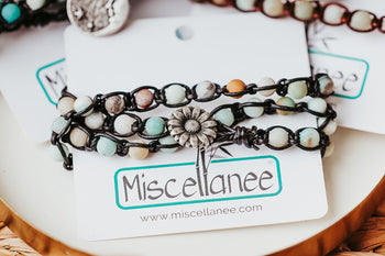 multi color amazonite beads macrame on leather cord with a flower button