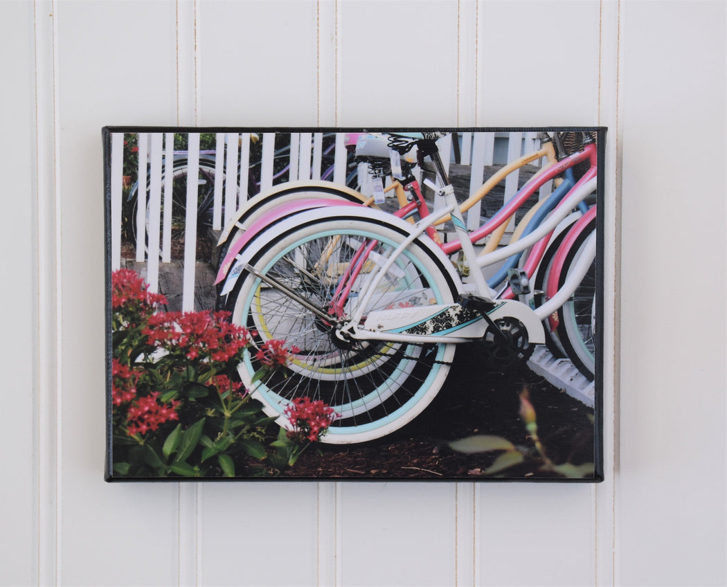 canvas photo of side view of multi color beach bikes parked