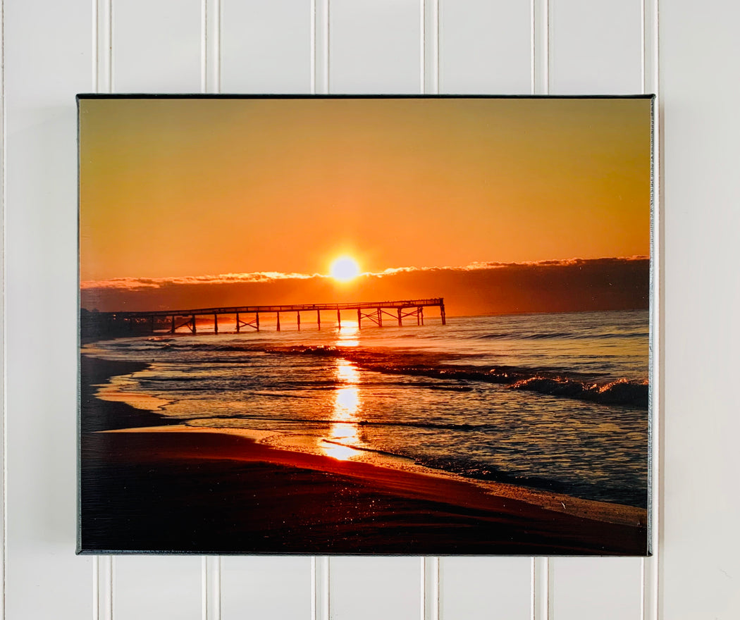 ocean sunrise with a pier canvas photo